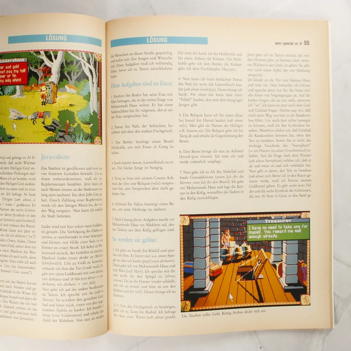 Nyitott ASM magazin szöveges játékmegoldásokkal és illusztrációkkal