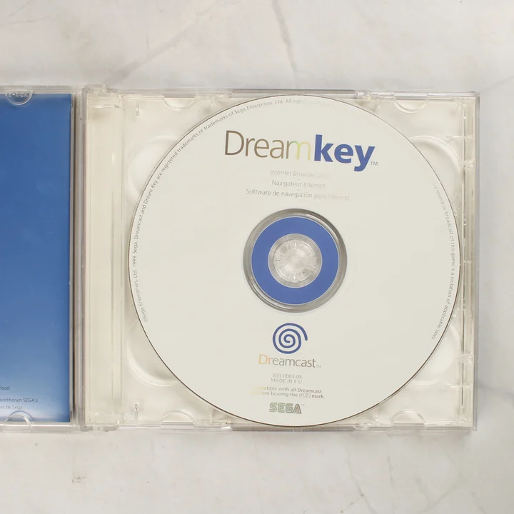 DreamKey lemez a nyitott tokban Sega Dreamcast DreamKey lemez átlátszó műanyag tokban
