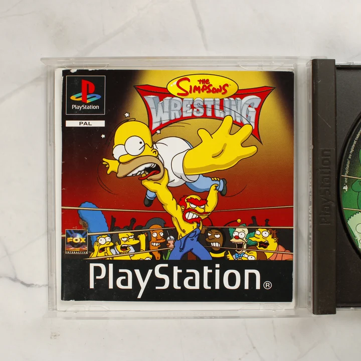 The Simpsons Wrestling PlayStation videójáték nyomtatott kiskönyvének borítója