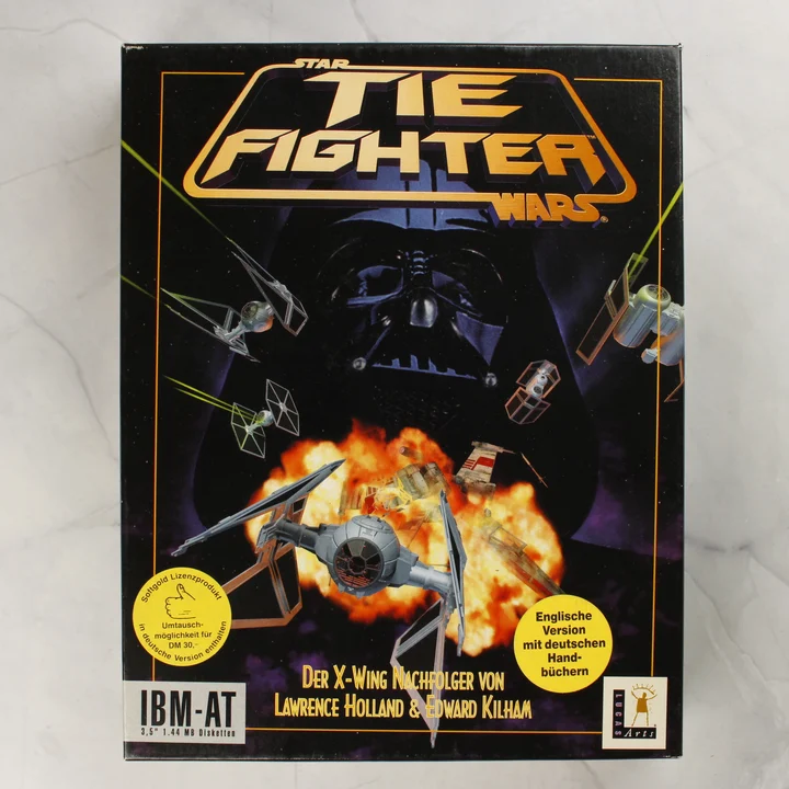 Star Wars TIE Fighter PC videójáték dobozának előlapja Darth Vader és TIE vadászok képével