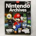 A Nintendo Archives gyűjtői könyv előlapja Marióval és játékkonzolokkal