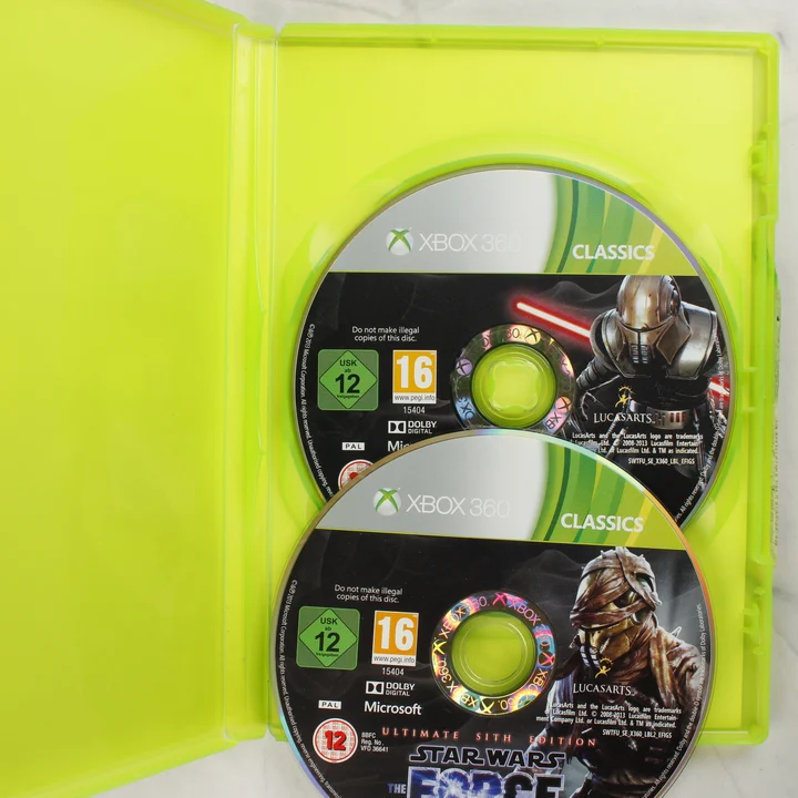 Nyitott Xbox 360 tok a Star Wars The Force Unleashed két lemezével