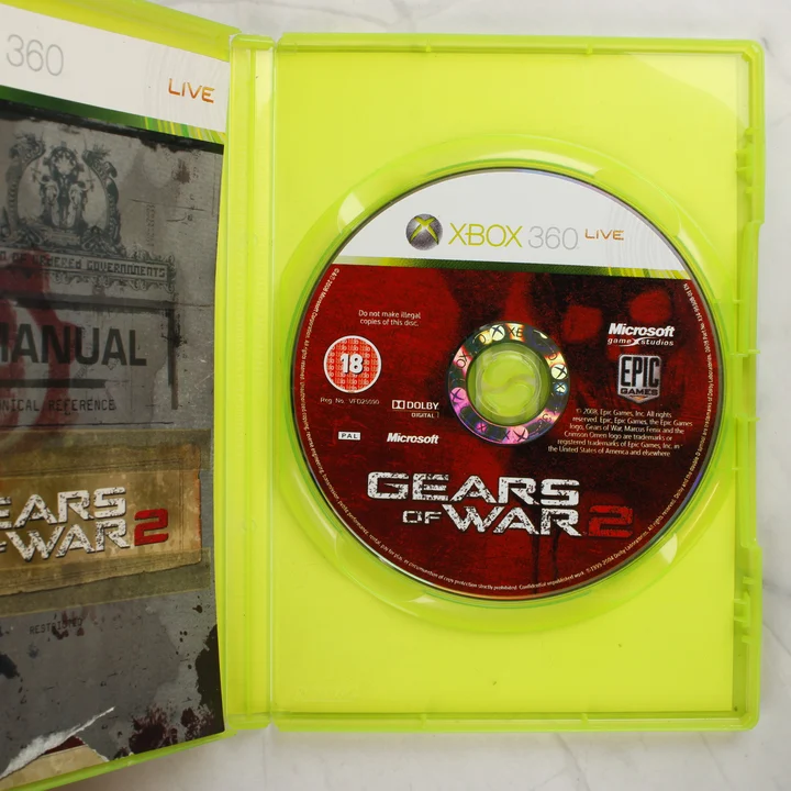Gears of War 2 Xbox 360 belső tartalom és lemez Nyitott Xbox 360 tok a Gears of War 2 lemezzel és a kézikönyvvel
