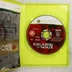 Nyitott Xbox 360 tok a Gears of War 2 lemezzel és a kézikönyvvel