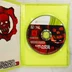 Nyitott tok a Gears of War 3 lemezzel és füzettel