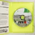 A felnyitott Xbox 360 műanyag tok a FIFA 12 lemezzel és a füzettel