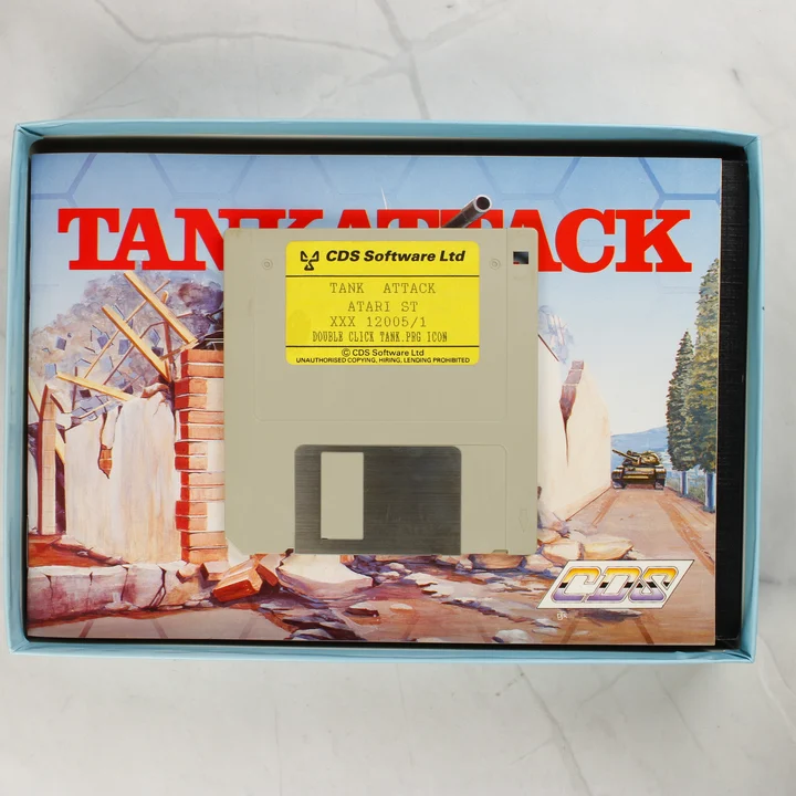 Tank Attack Atari ST floppy lemez 3,5 colos floppy lemez Tank Attack Atari ST címkével a doboz felett