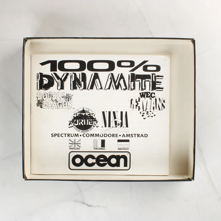 100% Dynamite használati útmutató A 100% Dynamite válogatás nyitott doboza a használati útmutatóval