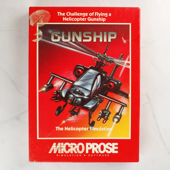 A Gunship videójáték piros dobozának előlapja egy harci helikopterrel
