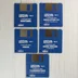 Öt darab kék Amiga floppy lemez a Virtual Reality Vol. 2 csomagból