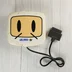 Hudson Soft Super Multitap 2 elölnézete Bomberman arccal