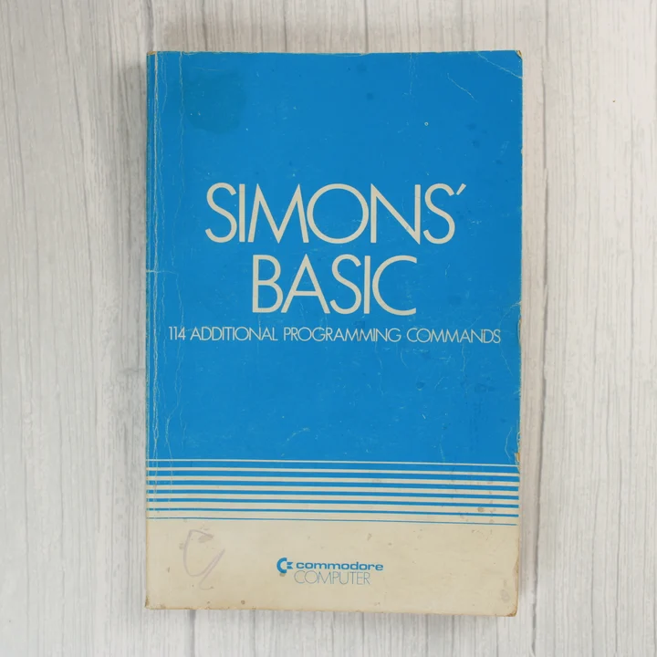 Simons' Basic kézikönyv előlap Simons' Basic kézikönyv előlapja Commodore 64-hez