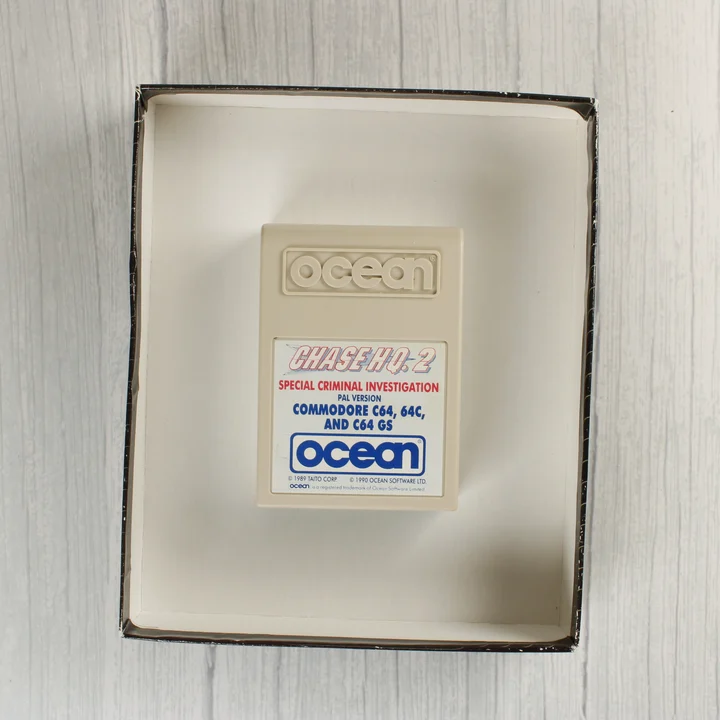 Chase H.Q. II C64 cartridge Chase H.Q. II Commodore 64 cartridge a dobozban