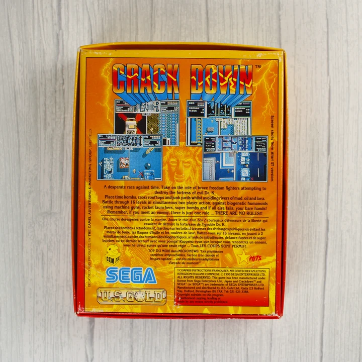 Crack Down C64 doboz hátnézet A Crack Down videójáték dobozának hátoldala leírásokkal és képernyőmentésekkel