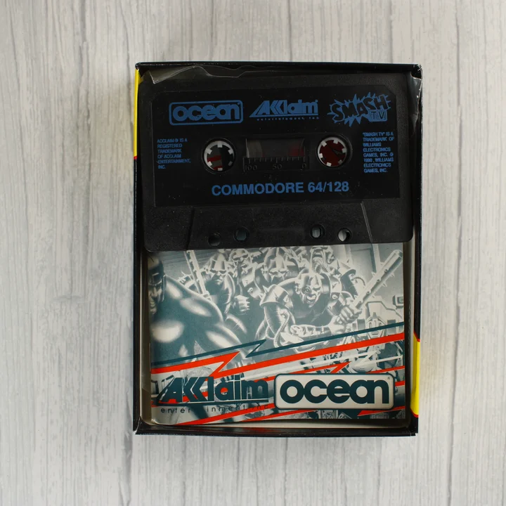 Smash T.V. Commodore 64 kazetta és útmutató a dobozban