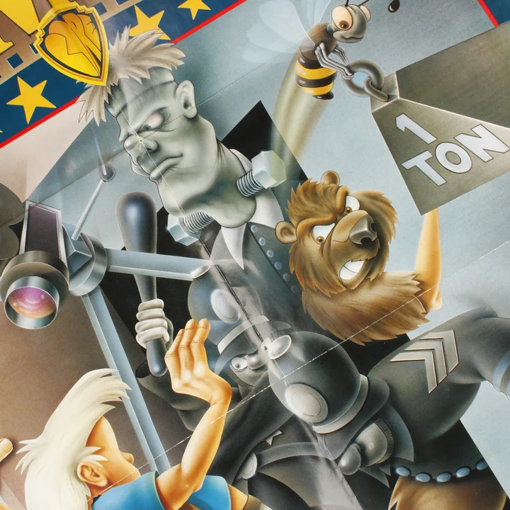 Közeli kép a doboz grafikájáról, Frankenstein és más karakterek láthatók.