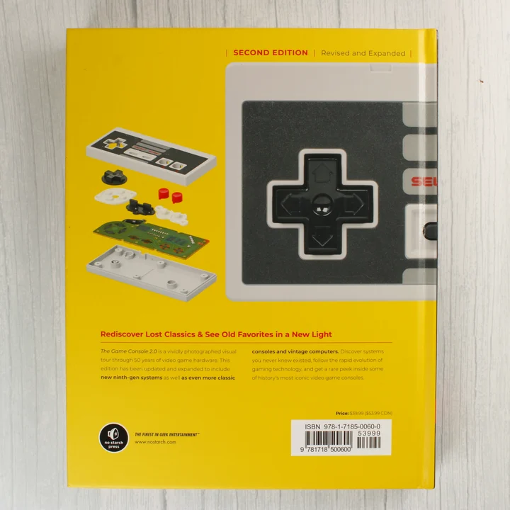 The Game Console 2.0 könyv hátoldala vonalkóddal és robbantott kontroller ábrával