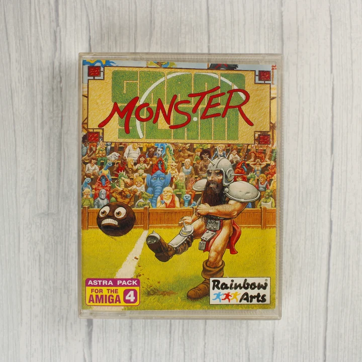 A Grand Monster Slam Amiga játék elülső borítója műanyag tokban