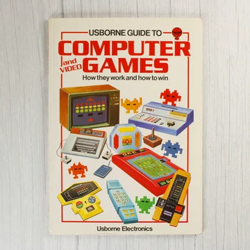 Az Usborne Guide to Computer and Video Games könyv színes borítója retro játékgépekkel.