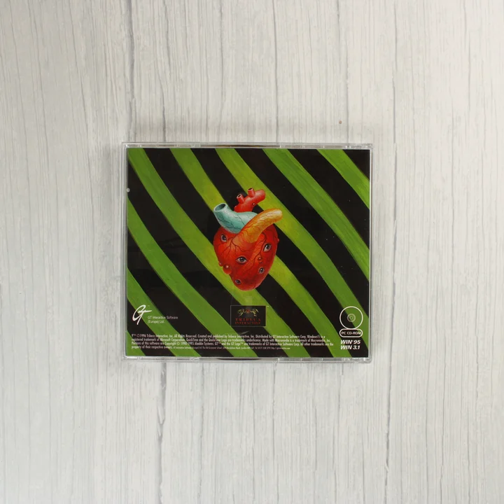 A CD-tok hátoldala szürreális szív grafikával