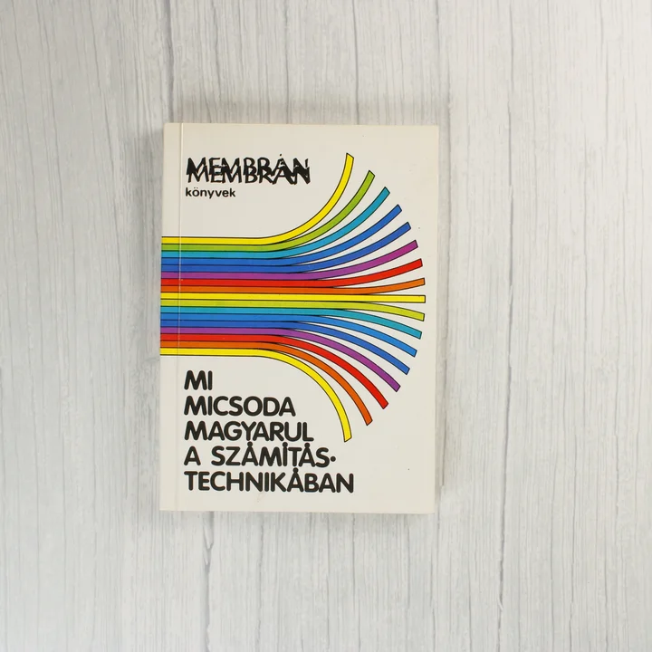 Mi micsoda magyarul a számítástechnikában borító A Mi micsoda magyarul a számítástechnikában című könyv színes csíkos borítója.