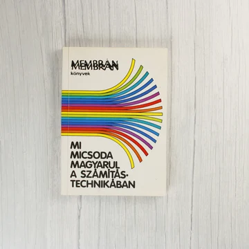 A Mi micsoda magyarul a számítástechnikában című könyv színes csíkos borítója.