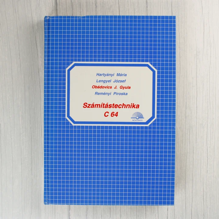 A Számítástechnika C 64 könyv kék négyzethálós borítója