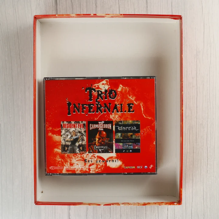 Trio Infernale nyitott doboz a CD-tokkal