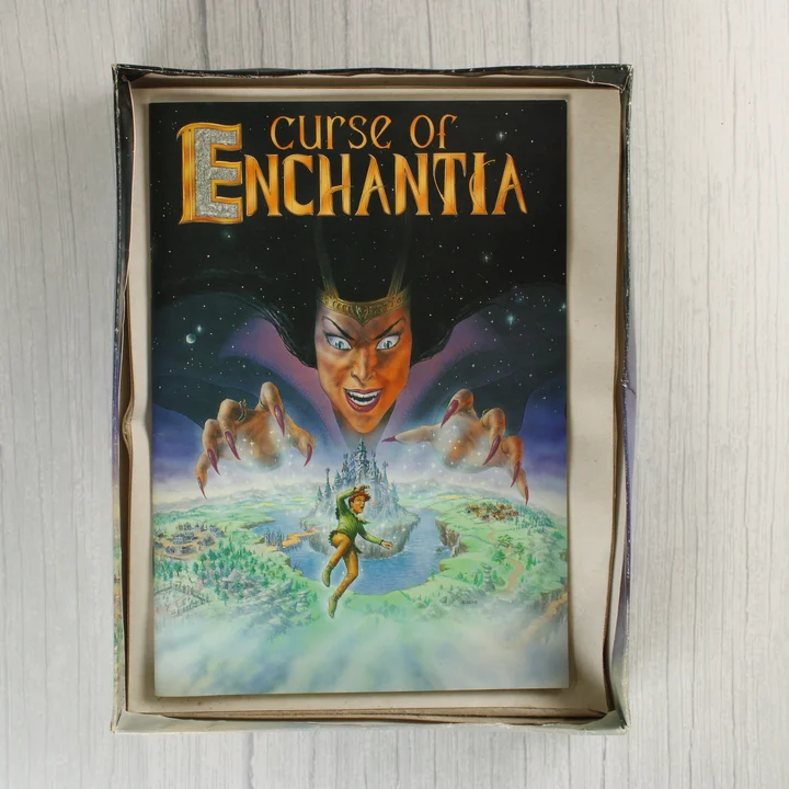 A nyitott dobozban látható használati útmutató füzet.