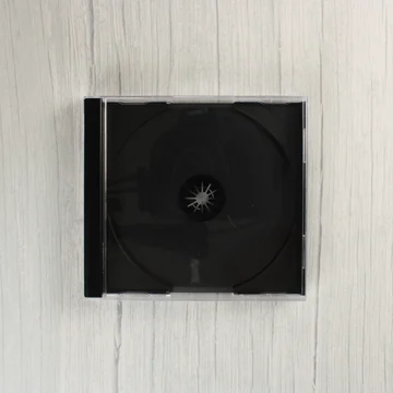 PlayStation 1 vastag CD-tok felülnézetből fekete tálcával