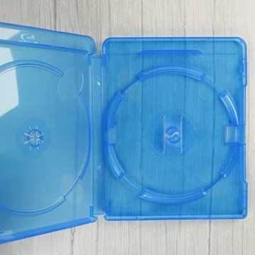 Nyitott, áttetsző kék Blu-ray tok belső nézete két lemezhely számára