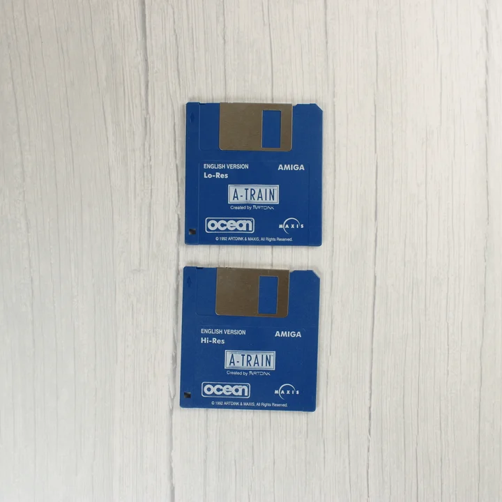 A-Train floppy lemezek Két kék színű 3,5 colos floppy lemez az A-Train játékhoz