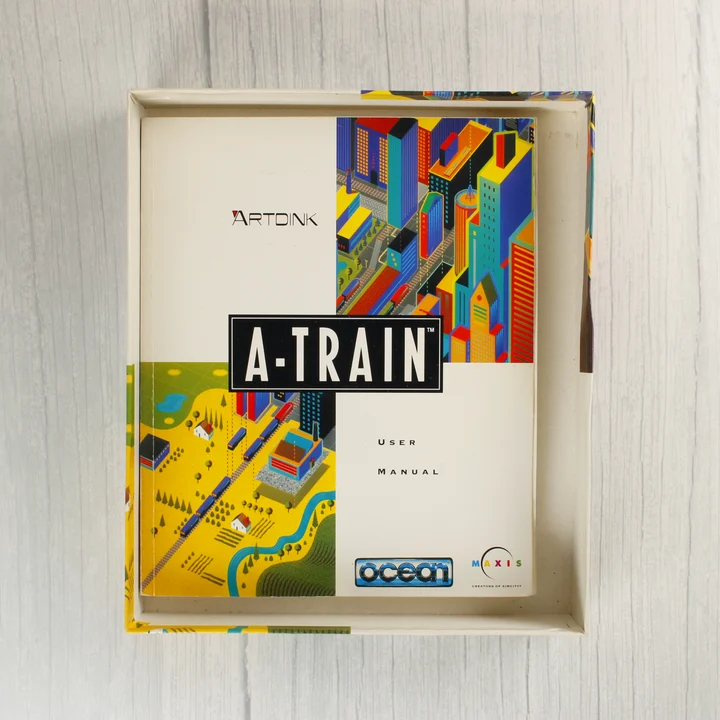 A-Train kézikönyv Az A-Train videójáték felhasználói kézikönyve a nyitott dobozban