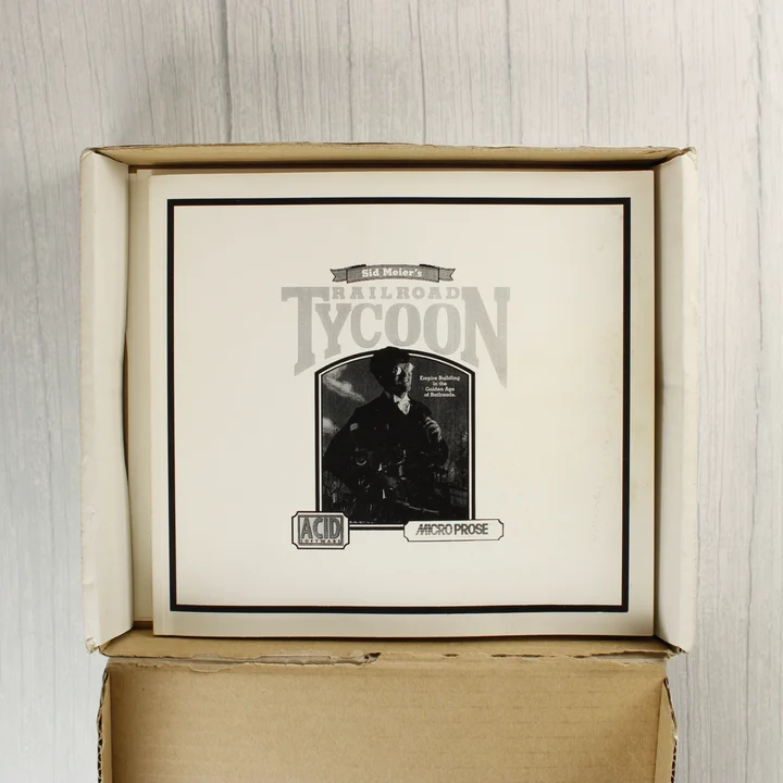 A Railroad Tycoon kézikönyve a nyitott dobozban